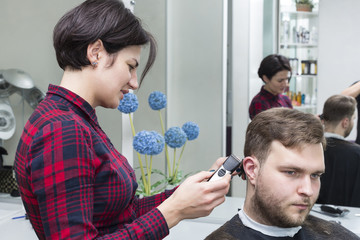 The young man at the hairdresser salon hairstyle make model