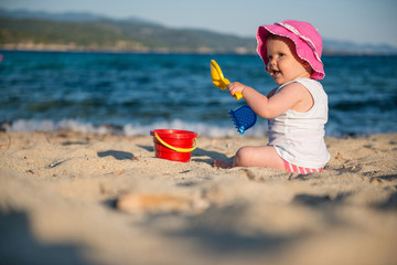 Caucasian little girl playing with bach toys