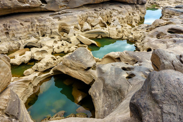 Natural sandstone group Eroded through time for thousands of years. Ubon Ratchathani, Thailand.