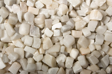 beautiful natural white stone scattered on a white background