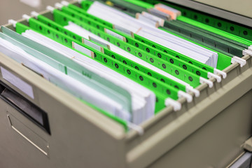 Green filing cabinets and file cabinets in the office