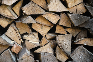 natural firewood stack rustic background, chopped wood