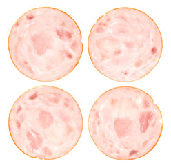 Ham slice isolated. Boiled and smoked ham or sausage isolated on white background, top view