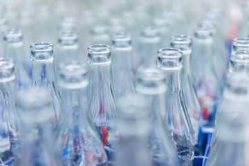 Empty soft drink bottles are kept neatly in the restaurant.