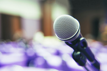 Microphone in the empty purple conference room before the meeting.