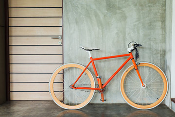 orange bicycle parked decorate interior living room modern style
