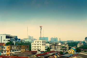 A slum in a big city on a cloudy day.