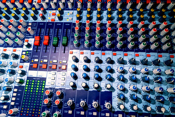 Audio control panel in the conference room in soft light.
