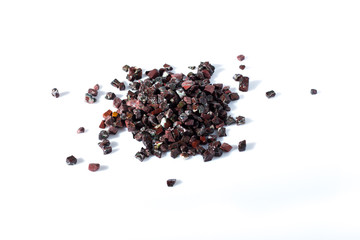 beautiful natural stone burgundy spilled on a white background