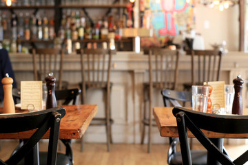 Fototapeta na wymiar Beer bar pub, long table with chairs