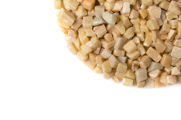 beautiful natural yellow stone scattered on a white background