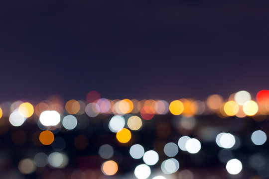 city night with dark sky, abstract blur bokeh light background