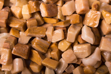 beautiful natural red stone scattered on a white background