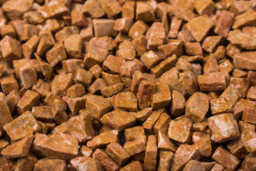 beautiful natural red stone scattered on a white background