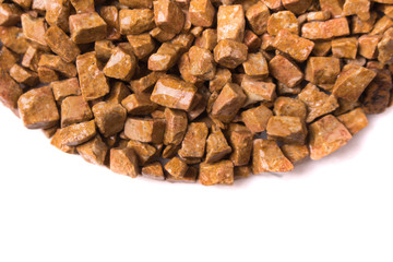 beautiful natural red stone scattered on a white background