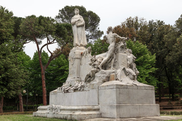 Fototapeta na wymiar Arezzo in Tuscany, Italy - Petrarch ( Francesco Petrarca) monument in Parco il Prato 