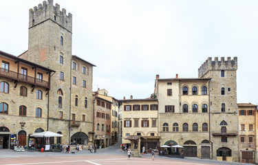 Fototapeta premium Arezzo in Tuscany, Italy - Piazza Grande, main square of historic Arezzo