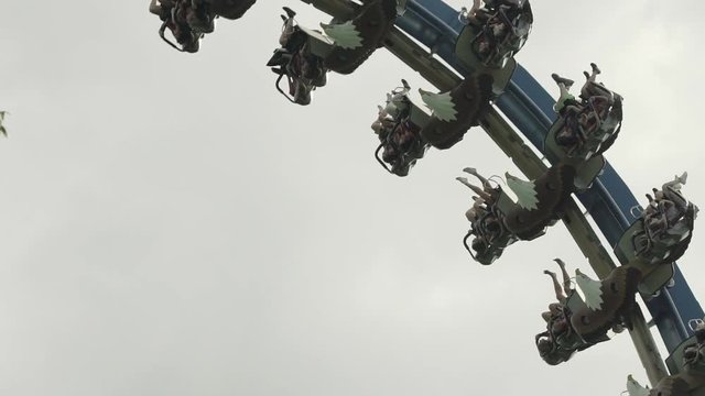 SLOW MOTION: People riding the roller coaster 4k