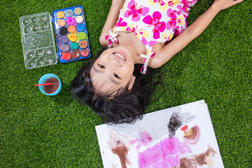 Asian Chinese little girl drawing and painting