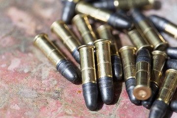  Many ammunition bullets. 22 LR for long rifle