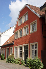 Fototapeta na wymiar Rotes historischen Gebäude in der Münsterstraße in Telgte, Nordrhein-Westfalen