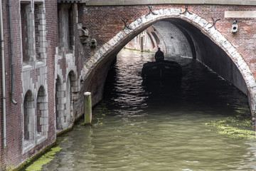 Fototapeta na wymiar Boat in Dutch Canal