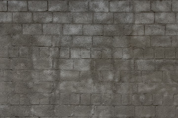 Gray with decorative plaster brick wall.