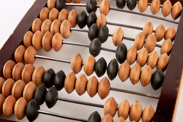 Antique wooden abacus. Old retro calculator. Money and poverty.