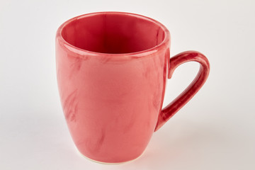 Empty porcelain cup isolated. Colorful tea cup on white background.