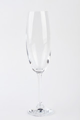 Empty champagne glass, white background. Single wineglass isolated.