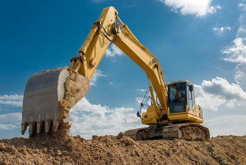 excavator blue sky heavy machine construction site - obrazy, fototapety, plakaty