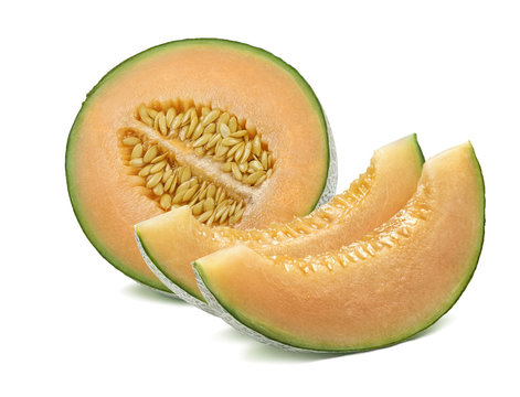 Half cantaloupe melon and slices isolated on white