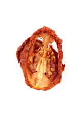 Sun dried tomatoes isolated on white background