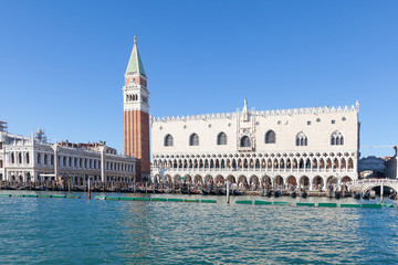Venice, Veneto, Italy. View of the Campanile, Doges Palace and Piazza San Marco, from the lagoon in early morning light
