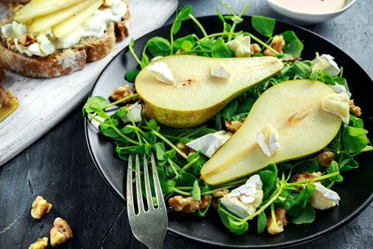 Fresh Sweet Pears Salad And Bruschetta With Cottage Cheese, Walnut On White Board.