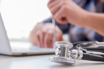 Computer repairman repairing computer laptop