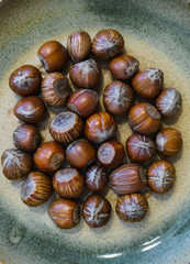 Different nuts scattered on the table.