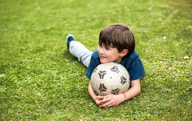 Young boy with a soccer ball