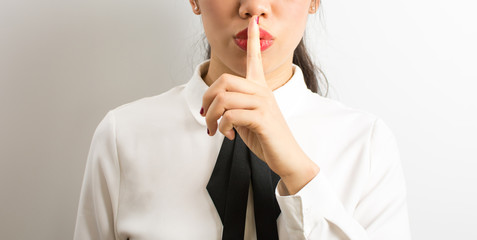Shhhhh! Businesswoman requiriong silence