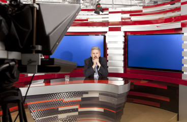A television anchorman at studio