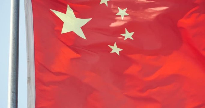 4k Chinese flag flutters in wind.
