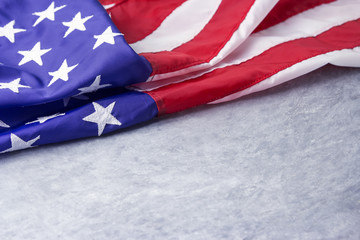 USA or american flag on cement background with copy space