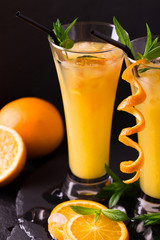 Aperitif with vodka, orange juice and mint. Screwdriver cocktail