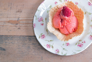Strawberry ice cream on waffles