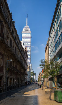 Pedestrian street in Mexico City downtown with Latinoamericana Tower on background - Mexico City, Mexico