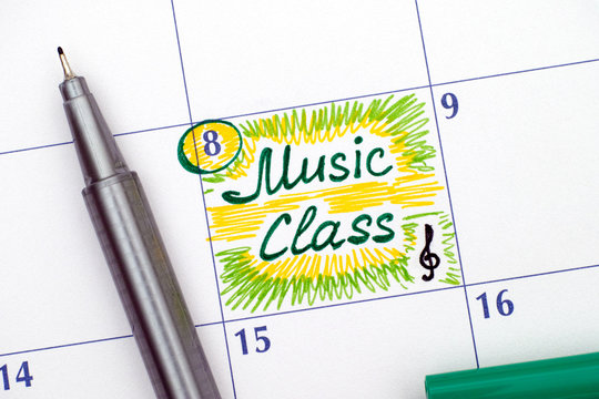 Reminder Music Class in calendar with pen
