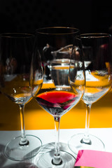 Red wine tasting on winery, wineglass