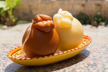 Traditional Italian hard cheese Provolone of Caciocavallo, white and smoked.