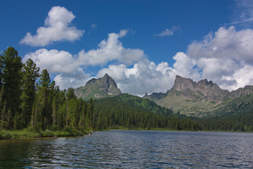 view from the lake on mountain peaks in Sayan Mountains