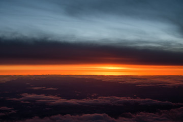 Aerial view of colorful sunrise and clouds